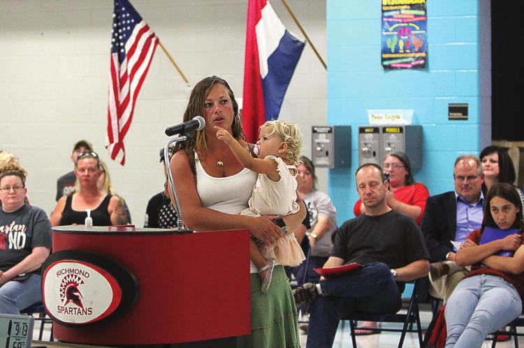 Corie Stevens, mother of four, said masks and school exercise do not mix and then referred to the audience of about 70 mostly maskless people, saying, “It speaks volumes whenever you have 90% of people showing up without masks on.” J.C. VENTIMIGLIA | Staff
