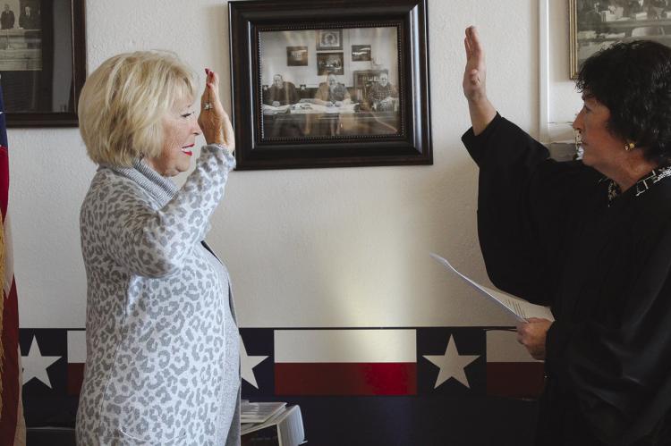 GOVERNOR APPOINTED Presiding Ray County commissioner Sheila Tracy (left) is sworn in by Eighth Judicial Circuit Court Judge Lori J. Baskins. SHARON DONAT | Staff