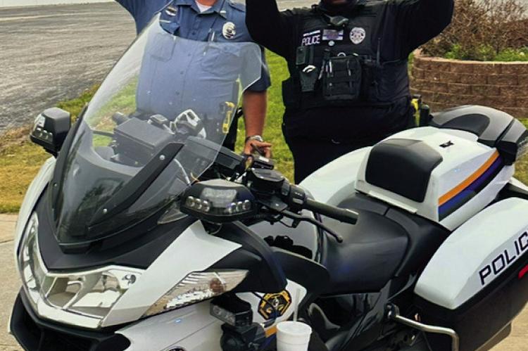 LOCAL LAW ENFORCEMENT officers promote motorcycle safety awareness as riding season begins. Submitted