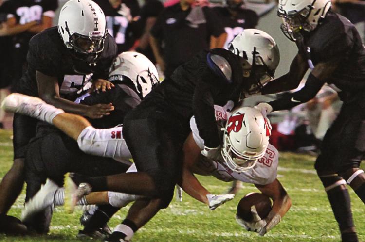 ASSISTING on Richmond’s seventh TD drive, running back Aidan Ivison dives for a couple of extra yards. Earlier in the game, Ivison catches a TD pass and grabs a scoop-and-score fumble for another touchdown. J.C. VENTIMIGLIA | Staff