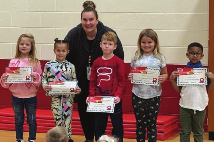 DEAR RESPONSIBILITY STUDENTS for kindergarten, from left, are Jocie Williams, Gracie Hicks, Mrs. Spratt, Owen Johnson, Heather Hayes and Avondre Jackson.
