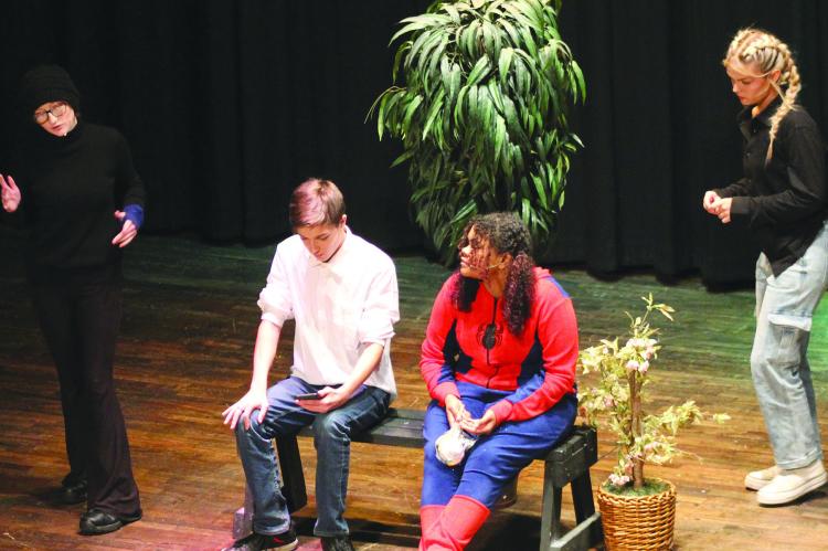 RICHMOND HIGH School actors Serenity Taylor (from left) as Bonnie, Timothy Vaughn as a father, Kara Clayton as a child and Alaina England as Claudine in the Farris Theater last weekend. SOPHIA BALES | Staff