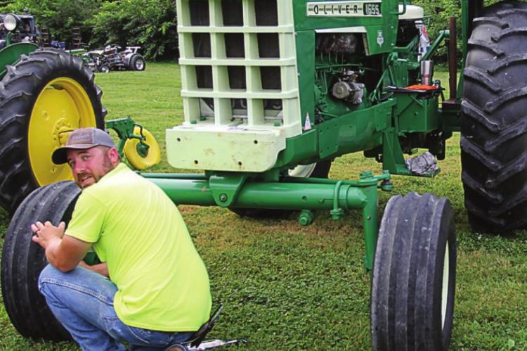 TRACTOR SHOWS are popular in ag areas, and Brandon Lamb shows off his during the Hardin Sesquicentennial.