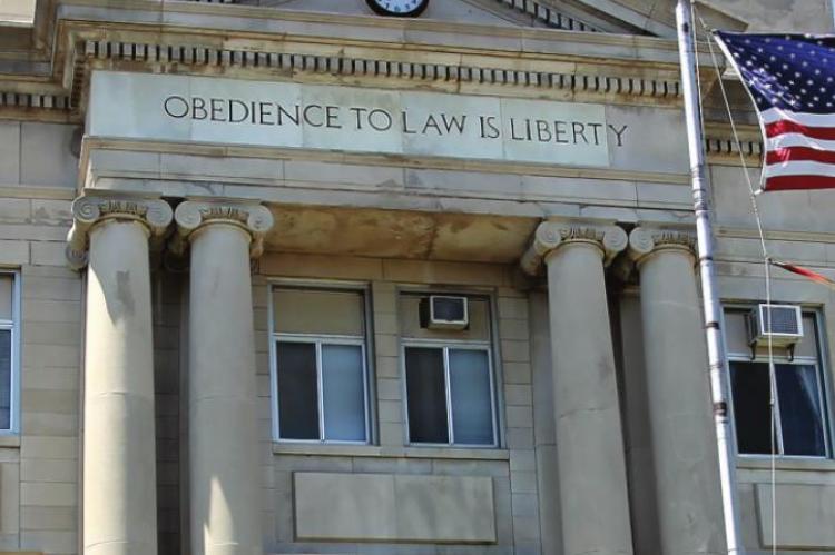 IN ADDITION to the Alexander Doniphan statue on the lawn, all four sides of the Ray County Courthouse contain the words, “Obedience to Law is Liberty.” The precept is an important part of the beliefs within the Church of Jesus Christ.