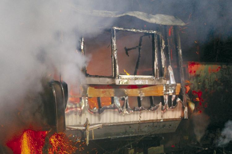 MIRANDA JAMISON | Staff THIS TRAILER was fully engulfed in flames upon arrival of firefighters on the scene.