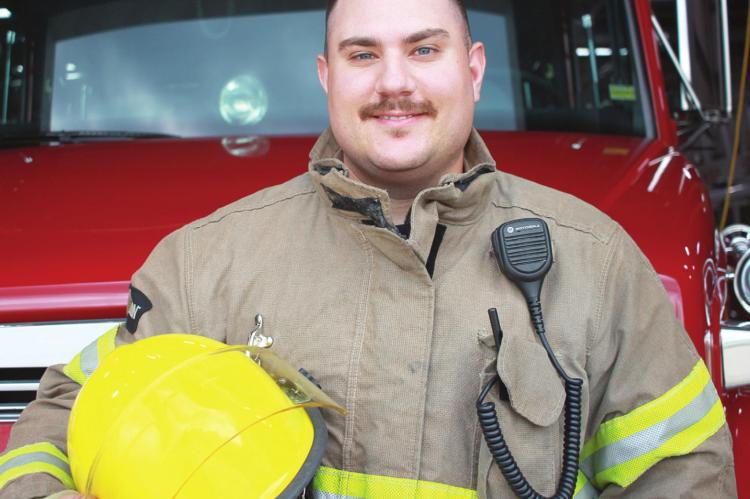 BRAD AMEN is comfortable in uniform, having served as a Marine before joining the Richmond Fire Department. SOPHIA BALES | Staff