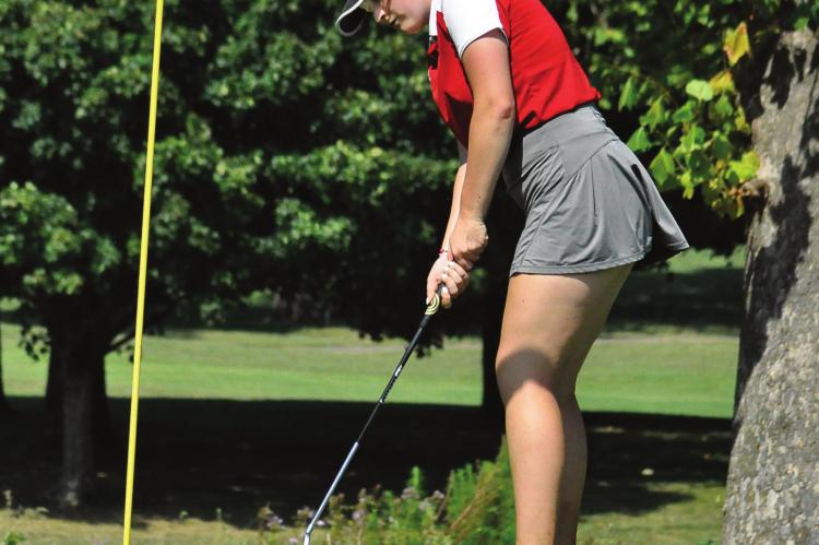 RICHMOND JUNIOR Kennedy Wrisinger attempts a putt on the 18th green Monday afternoon in the Odessa Tournament at Shirkey Golf Course in Richmond. SHAWN RONEY | Staff