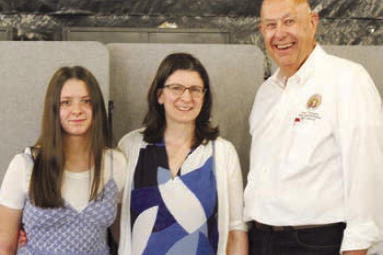 LILLY LADEK (from left) and her mother, Jennifer, stand by State Representative Terry Thompson. SHARON DONAT | Staff