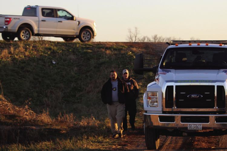 RAY COUNTY Sheriff’s Department Investigators Josh Hamner (left) and Celeste Kaiser clear out the death investigation scene on Pryor Rd. in Ray County. MIRANDA JAMISON | Staff