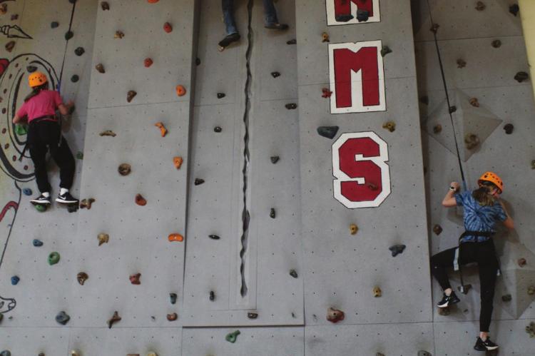 RICHMOND Middle School students climb the climbing wall, which school information states might be one of the largest in the state.