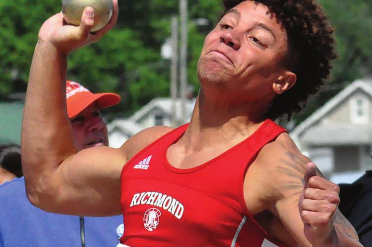 KEYSHAUN ELLIOTT attempts a shot put throw during Class 3 state competition in Jefferson City. Elliott goes on to help two Richmond boys relay teams set school records, one of them a state championship finish. SHAWN RONEY | Staff