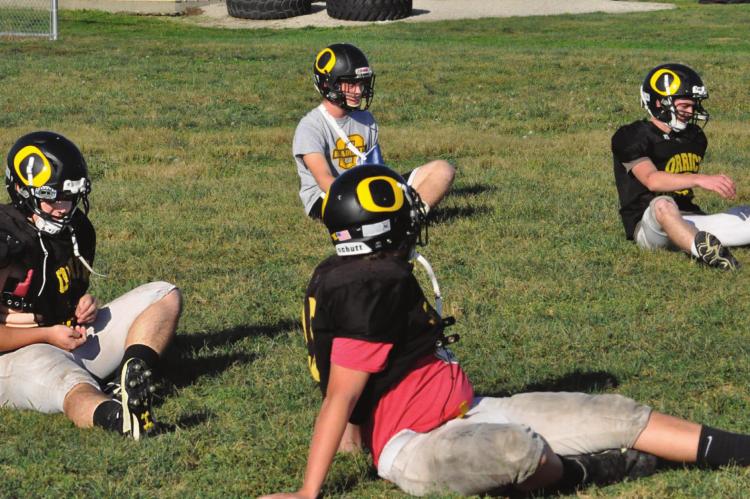 THE BEARCATS stretch Monday on their practice field as they beging prepping for rival NHC. SHAWN RONEY | Staff