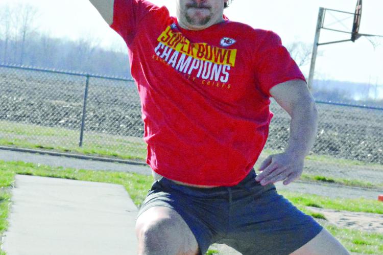 ORRICK SENIOR Jaxon Miller, back to participating in track and field after being sidelined last season while recovering from surgery, jumps March 11 as practice wraps. SHAWN RONEY | Staff
