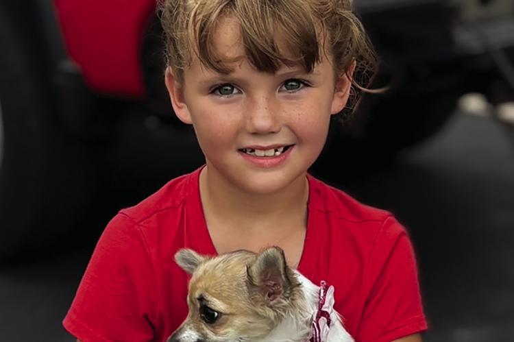 KYNNLEIGH O’DELL and her little dog, Magazine enjoy the fireworks at the American Celebration. JOSHUA BRUNGARDT | Staff