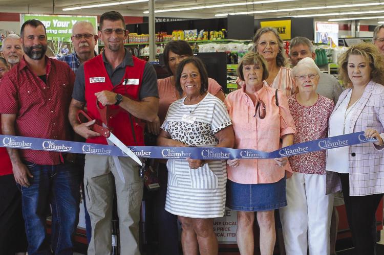 LOCAL COMMUNITY members and stakeholders participate in Tractor Supply Co. ribbon cutting last week. SOPHIA BALES | Staff