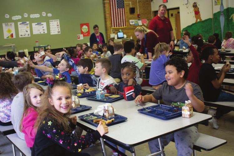 WRIGHT ELEMENTARY SCHOOL receives a grant so all students eat lunch free. The Flavor Bar’s most popular items are hot sauce and banana peppers. AMY MAYER | Harvest Public Media