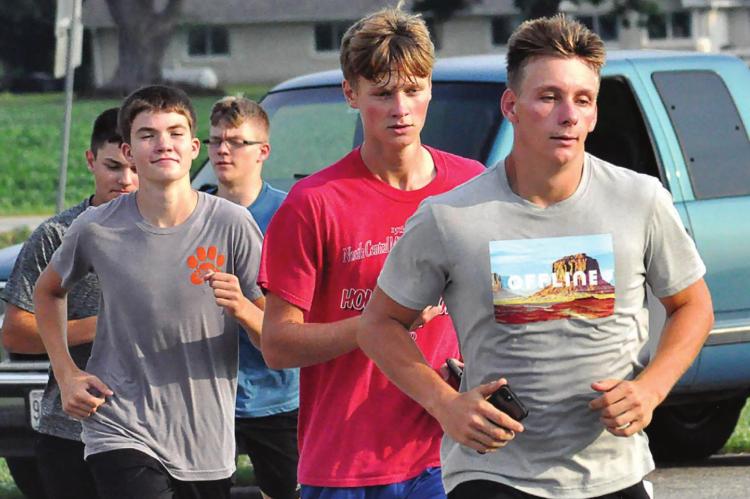 THE BULLDOGS look to qualify as a team for state in boys cross country. SHAWN RONEY | Staff