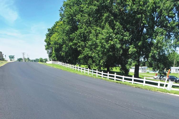 TO GET STREETS this year to look as good as this one, done last year, a few detours will need to occur.
