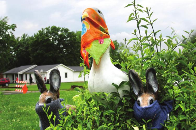 THE CORONAVIRUS continues to be a source of health, economic and social pain for many people. In a sign of the times, and in the spirit of “laughter is the best medicine,” the yard ornaments at 102 Ridgeway in north Richmond are not social distancing, but are wearing masks.