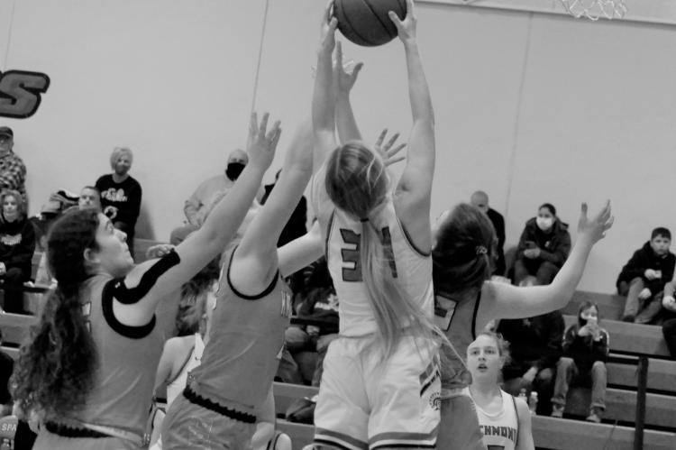 In her reach