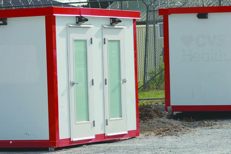 MYSTERY BOXES sit behind jail in Henrietta. SOPHIA BALES | Staff