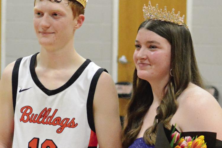 KADEN McGINNIS (left) and Lilly Lyon are the 2026 courtwarming king and queen at Hardin-Central. The two were crowned after Hardin-Central’s varsity girls and boys basketball games with Higbee. SHAWN RONEY | Staff
