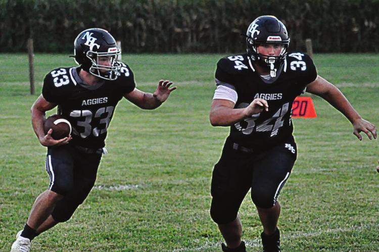 BRAYDEN SCHICK, seen here carrying the football Sept. 3 at Norborne against Knox County, gets the call 33 times during Norborne Hardin-Central’s 40-34 double-overtime loss to Braymer/Breckenridge Sept. 24 at Braymer. SHAWN RONEY | Staff