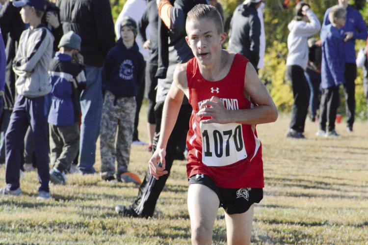 RICHMOND’S ADAM SUMMERS heads toward the finish line of the boys varsity race on a cool Oct. 8 morning at the Battle of Lexington Invitational on the Lexington High School campus. SHAWN RONEY | Staff