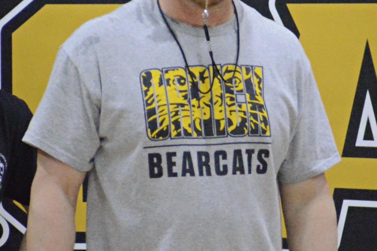 SETH SMITH, the new head track and field coach for Orrick High School, puts his Bearcats through their paces. SHAWN RONEY | Staff