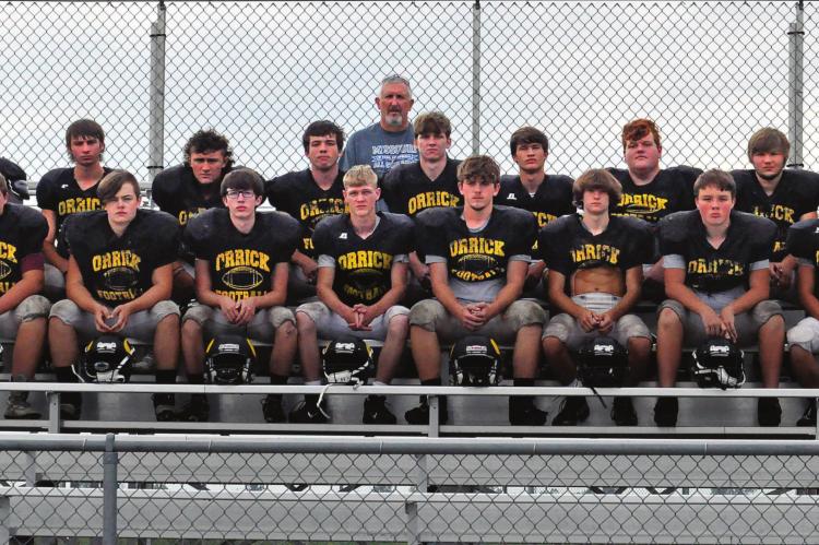 MEET THE BEARCATS, Orrick’s varsity 8-man football team. Pictured are, from left, front row, Maddox Peterson, Ashton Toland, Jonathon Harris, Gunner Smith, Tucker Greer, Jeff Rohde, Ryan Werle and Brecken Butler; second row, Mason Furner, Hunter Spear, Milo Nay, Nolan Werle, Chanler Woods, Zander Stevinson, Ross Greer, Mason Merritt and Blake Buchanan; back row, Kirk Thacker, head coach. SHAWN RONEY | Staff