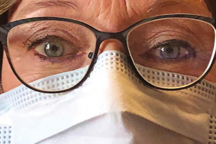 LAWMAKERS IN MASKS may not surprise some taxpayers, but in this situation, Rep. Peggy McGaugh wears a mask due to COVID-19 concerns.