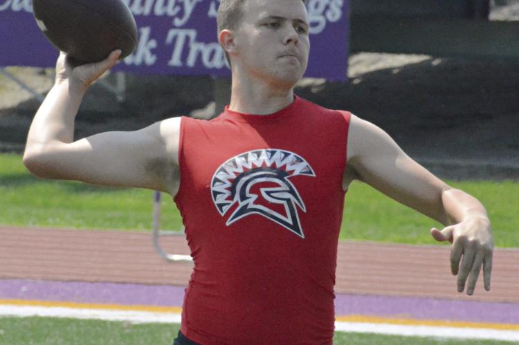 JAYDEN PEARSON rears back to throw the football as Richmond participates in high school 7-on-7 scrimmages. The session this week was the first of three Tuesday morning sessions scheduled this month for Pearson and his fellow Spartans at Kearney High School. SHAWN RONEY | Staff