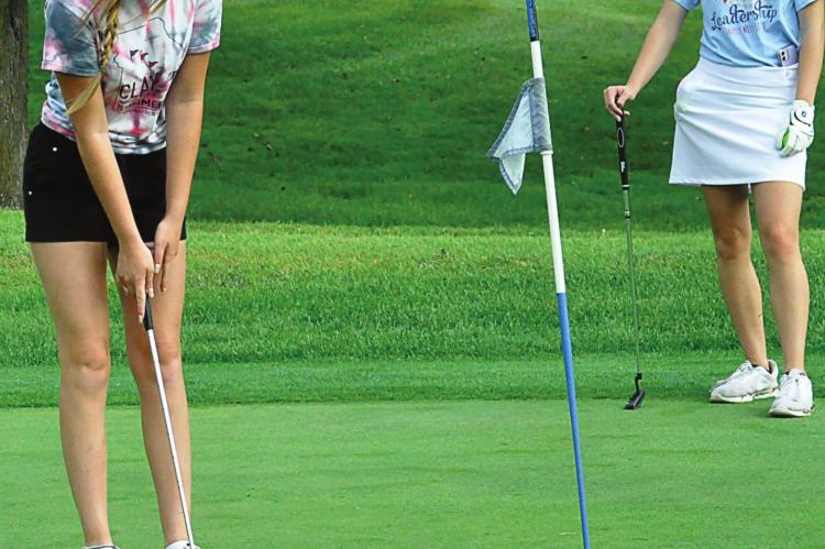 HANNAH NORRIS practices her putting Aug. 14 at Shirkey Golf Course. SHAWN RONEY | Staff