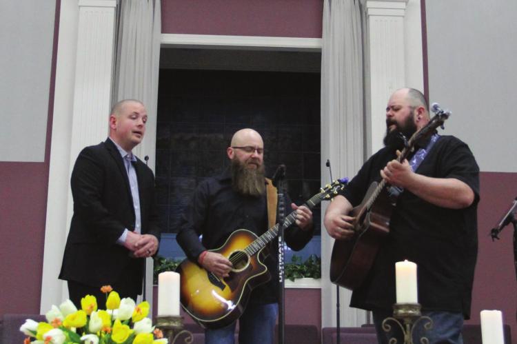 SPIRITUAL MUSIC plays in the sanctuary. Harmonizing, from left, are chief vocalist Jeremy Pope, and vocalists/guitarists James Wynn and Tim Bovard. J.C. VENTIMIGLIA | Staff