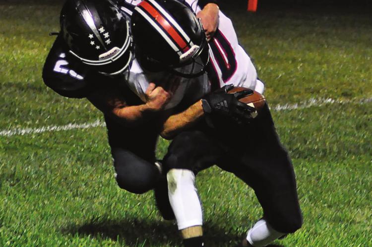 SENIOR NATE HAWKINS, seen here making a tackle, is one of two seniors Norborne Hardin-Central lose to graduation from this season’s 6-4 campaign. SHAWN RONEY | Staff