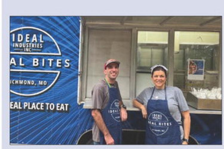 TIM JENKINS (FROM LEFT) and Heather Pugh prepare for customers. Read story on Page 3. SOPHIA BALES | Staff