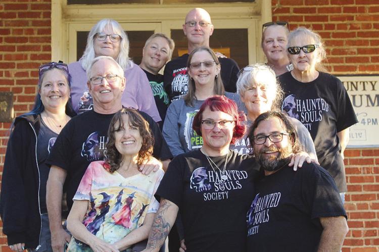THE HAUNTED SOULS SOCIETY investigative team prepare for the event at the Ray County Museum. SHARON DONAT | Staff