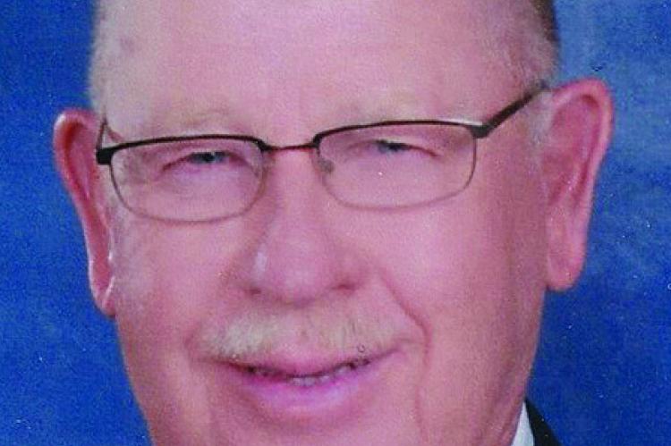 HARVEY J. SEELY