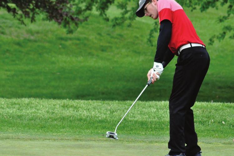 RICHMOND JUNIOR Aiden Bowman putts on the ninth green in Class 2 District 4 Tournament Competition Monday afternoon at Shirkey Golf Course en route to a state-qualifying finish. SHAWN RONEY | Staff