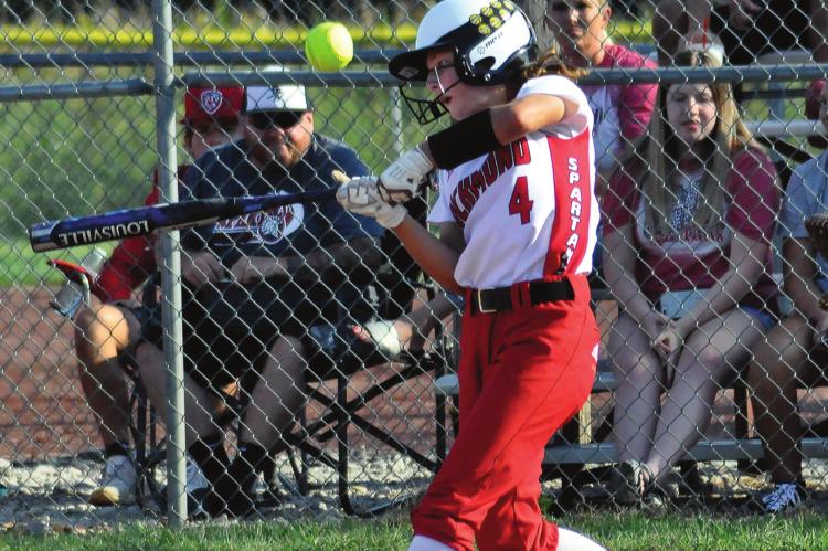 SOPHOMORE SYDNEY APPLEBERRY takes a cut at a pitch in the bottom of the first inning of Richmond’s 18-3 rout of Lexington in three innings Monday at Southview Park in Richmond. SHAWN RONEY | Staff