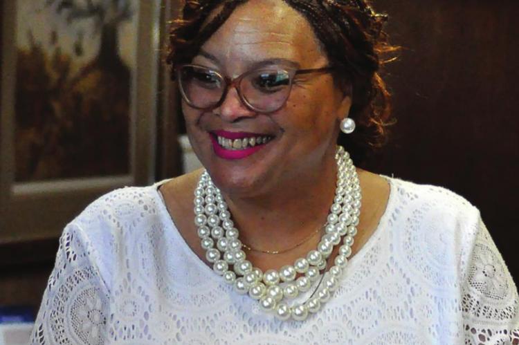BRIDGE OF HOPE CEO Connie Taylor celebrates paying off the 15-year building debt after less than six months SHAWN RONEY | Staff