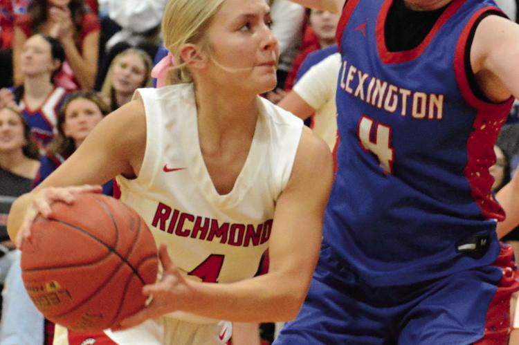 A FEW QUARTERS before sinking the game-winning shot, Ella Steele (left) looks to score while guarded by Zoey Earnest. SHAWN RONEY | Staff