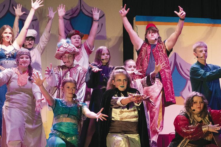CAST MEMBERS work through a group number during a rehearsal of Aladdin at Orrick, preparing for this past weekend’s performance.