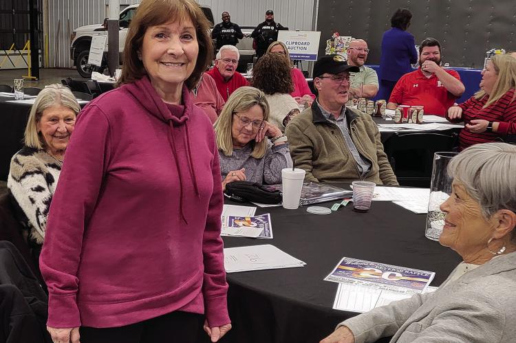 NANCY GILBERT has the winning number at the annual Richmond Rotary Reverse Raffle, taking home the grand prize of $10,000. SHARON DONAT | Staff