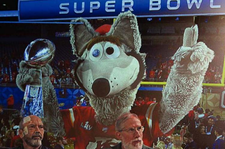 A PROJECTION during the annual Mayor’s Prayer Breakfast shows KC Wolf holding the Super Bowl trophy won in February by the Kansas City Chiefs. J.C. VENTIMIGLIA | Staff