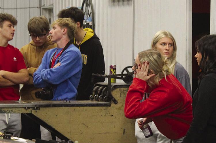 RICHMOND HIGH SCHOOL journalism students listen as Richmond News staff explain the steps behind plate production during a pressroom tour. SHARON DONAT | Staff