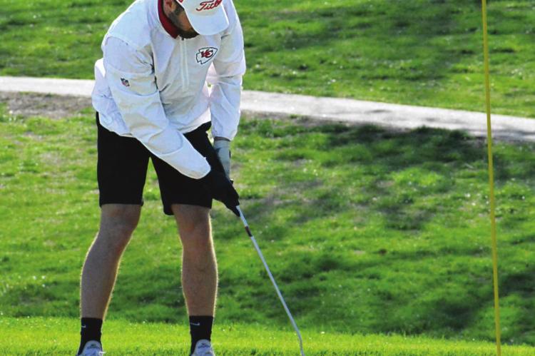 RICHMOND SENIOR Collin Cromley sinks a putt Monday, also Senior Day for the Spartans, during triangular play with Orrick and Knob Noster at Shirkey Golf Course. SHAWN RONEY | Staff