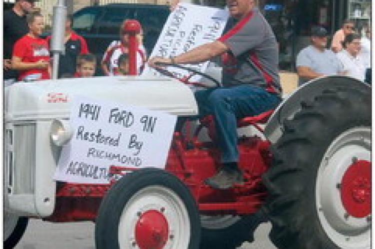 RICHMOND HIGH School (RHS) FFA Advisor Charles Foreman drives a restored 1941 Ford 9N. The tractor was restored by RHS students.