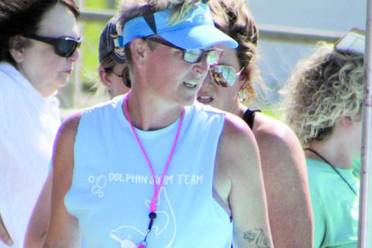 TRISH FIELDS COACHES youth swimmers, a role she took on after her own children joined the team. SHARON DONAT | Staff