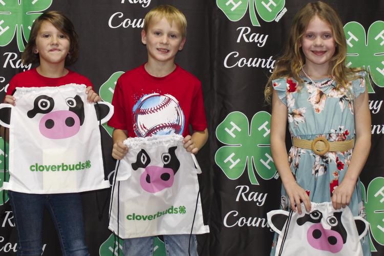 TRU BARHAM (from left) Mike Dolt and Lillianna Opfer receive Clover Kid Award. RAY COUNTY 4-H | Submitted